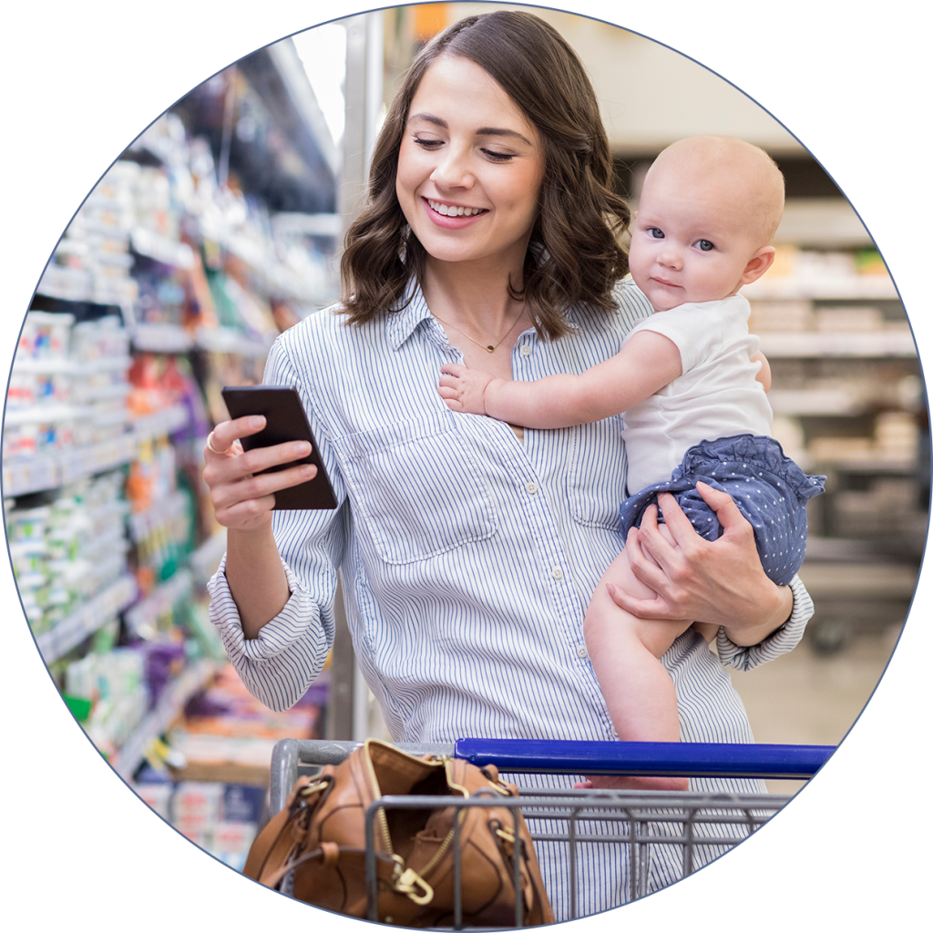 woman using gapwallet discounts in store with her child